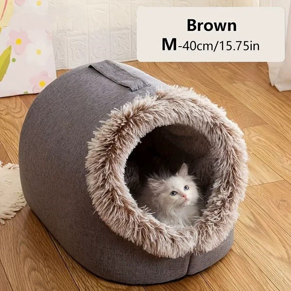 Comfortable and portable cat bed, warm and padded, with handle.