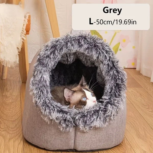 Comfortable and portable cat bed, warm and padded, with handle.