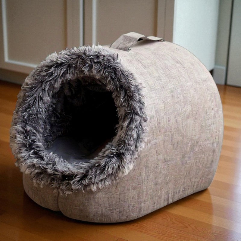 Comfortable and portable cat bed, warm and padded, with handle.
