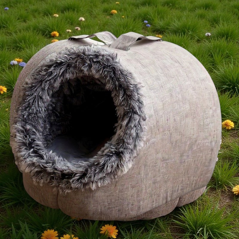 Comfortable and portable cat bed, warm and padded, with handle.